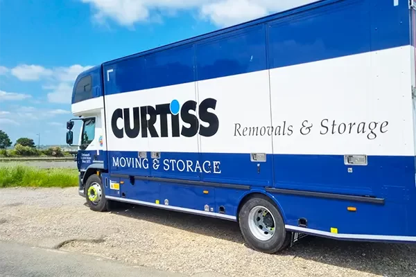 A removals company truck moving a family home in Portsmouth